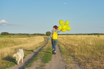 Running girl with white dog and yellow balloons, back view