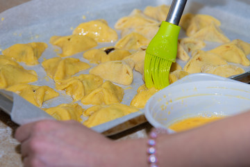 Baking process. Making traditional jewish cookies Haman's ears for Purim holiday