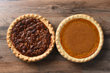 Top View of a fresh baked pumpkin pie and a pecan pie
