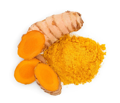 Turmeric powder and turmeric root isolated on white background. Top view. Flat lay