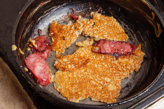 Pancake with Polish sausage in a pan
