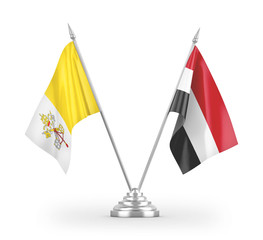 Yemen and Vatican table flags isolated on white 3D rendering