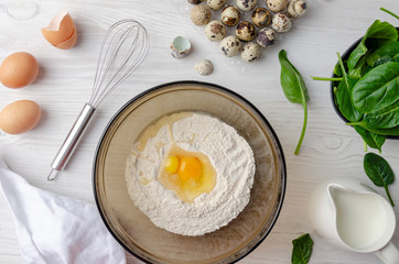 Baking ingredients for making pancake on white table