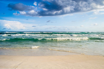 Graceful waves flowing onto the shore