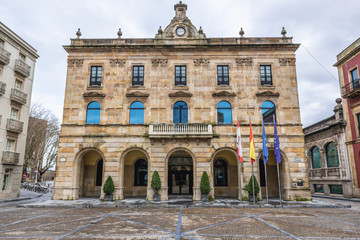 Fototapeta na wymiar Facade of Town Hall in historic part of Gijon city in Asturias region of Spain