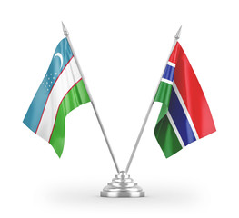 Gambia and Uzbekistan table flags isolated on white 3D rendering