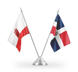 Dominican Republic and Gibraltar table flags isolated on white 3D rendering