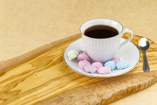 breakfast, coffee with bize cookies on olive wood board