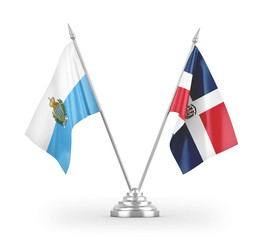 Dominican Republic and San Marino table flags isolated on white 3D rendering