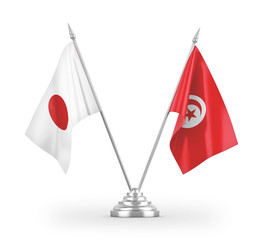 Tunisia and Japan table flags isolated on white 3D rendering