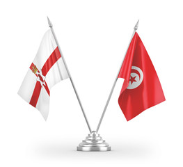 Tunisia and Northern Ireland table flags isolated on white 3D rendering