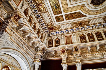 Detail of the Throne Room gold and white ceiling of the Schwerin Castle or Palace (Schloss). It is situated on an island in the city's main lake, the Lake Schwerin. 
