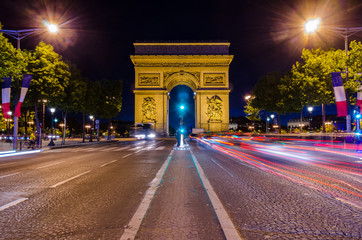 Magnificent view of Arc de Triomphe at night in Paris France