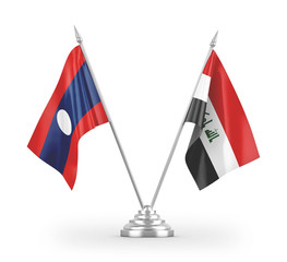 Iraq and Laos table flags isolated on white 3D rendering.