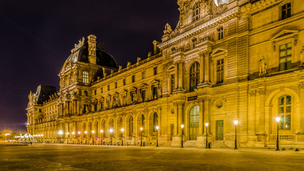 Amazing view of Louvre Museum at night in Paris France