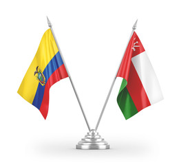 Oman and Ecuador table flags isolated on white 3D rendering