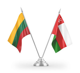 Oman and Lithuania table flags isolated on white 3D rendering
