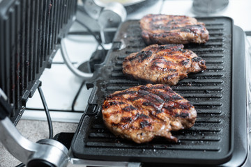 Steaks on the grill.