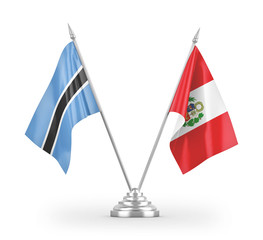 Peru and Botswana table flags isolated on white 3D rendering