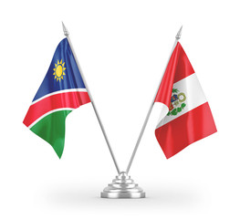 Peru and Namibia table flags isolated on white 3D rendering