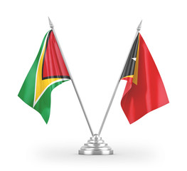 East Timor and Guyana table flags isolated on white 3D rendering