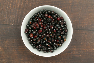Dark blue small grapes or Vaccinium meridionale, agraz, close up.