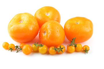 Big and little yellow tomatoes