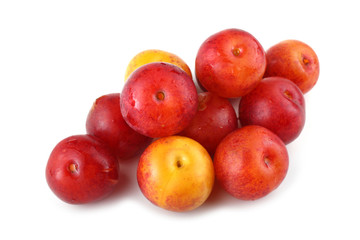 Plums isolated on white