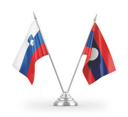 Laos and Slovenia table flags isolated on white 3D rendering