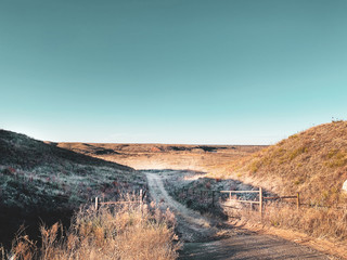 Hill country scenic dirt road. blu sky