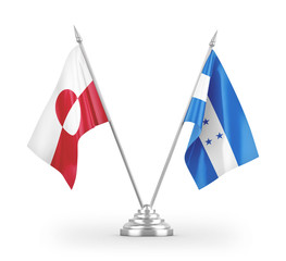 Honduras and Greenland table flags isolated on white 3D rendering