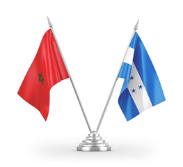 Honduras and Morocco table flags isolated on white 3D rendering