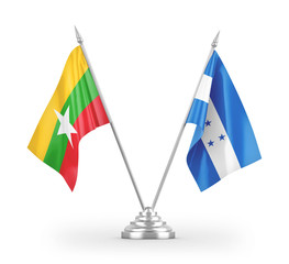 Honduras and Myanmar table flags isolated on white 3D rendering