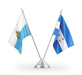 Honduras and San Marino table flags isolated on white 3D rendering