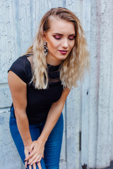 Fototapeta premium Attractive lady with blond hair and bright makeup