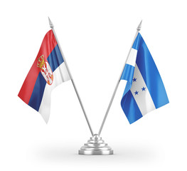 Honduras and Serbia table flags isolated on white 3D rendering