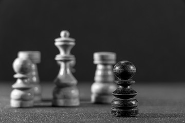Image of Chess Pieces on Board for Game; black and white style