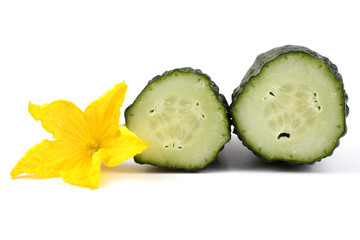 Cucumber halves and flower