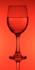 creative wine glass photography with Red background