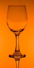 creative wine glass photography with orange background