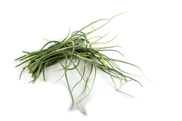 Obraz premium Czosnek strzały na białym tle