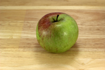 Green apple on board