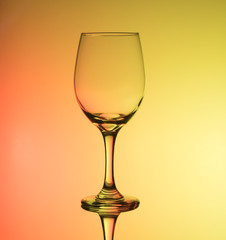 creative wine glass photography with yellow background