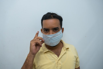 Man wearing a mask, white background. Virus concept