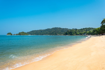 The island of Pangkor with the beach of the tourist village Teluk Nipah and the small isle of Giam in the Malaysian state of Perak at the west coast of the peninsular
