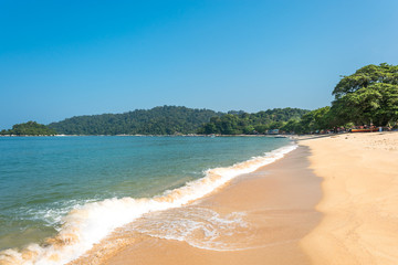 The island of Pangkor with the beach of the tourist village Teluk Nipah and the small isle of Giam in the Malaysian state of Perak at the west coast of the peninsular