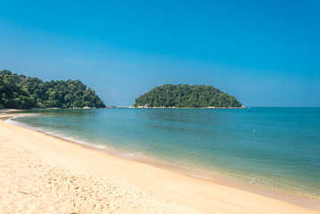 Pangkor island with the beach of the tourist village Teluk Nipah and the small isle of Mentangor in the Malaysian state of Perak at the west coast of the peninsular