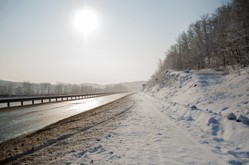 art photo of the road to the sun after a snowfall
