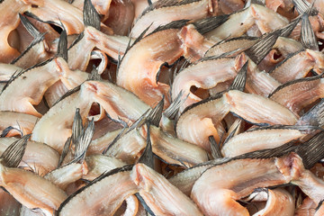 Dried striped snake head fish, salty taste.