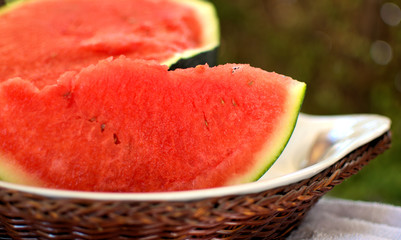 Greece , watermelon from a thessaly plain . superb for the North, but it also grows well in heat and drought. The flesh is red and deliciously sweet. Fruit has a dark rind and weighs 8-12 lbs each.